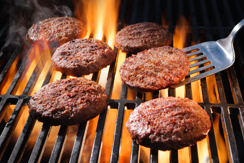 How Often Should You Flip Burgers on a Charcoal Grill? A Grilling Expert Weighs In